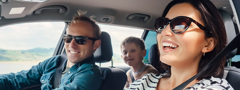 Safe driving. Happy family in a car.