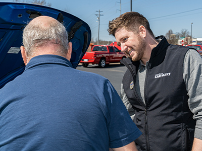 Ryan Human, Car-Mart's Director of Associate Development, conducting individual training with a Future Manager