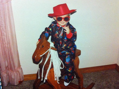 Leon's son, Leo, on a wooden horse