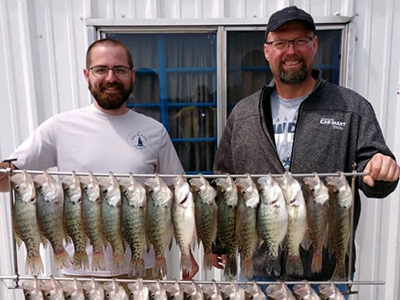 Leon and his son, Leo, on a fishing trip